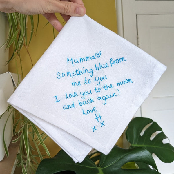 personalised handkerchiefs, made from white organic cotton, hand embroidered with custom handwritten messages