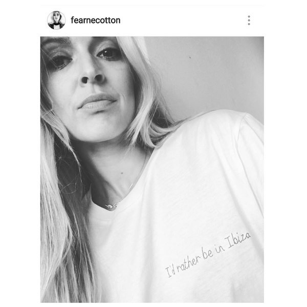 fearne cotton wearing an organic cotton white slogan t-shirt, embroidered with 'i'd rather be in ibiza' in red thread. 