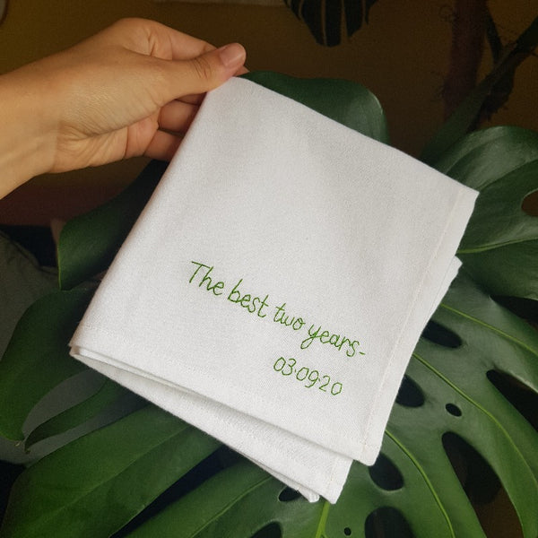 personalised handkerchief gift, made from white organic cotton, hand embroidered with custom message - the best two years - and date of second wedding anniversary