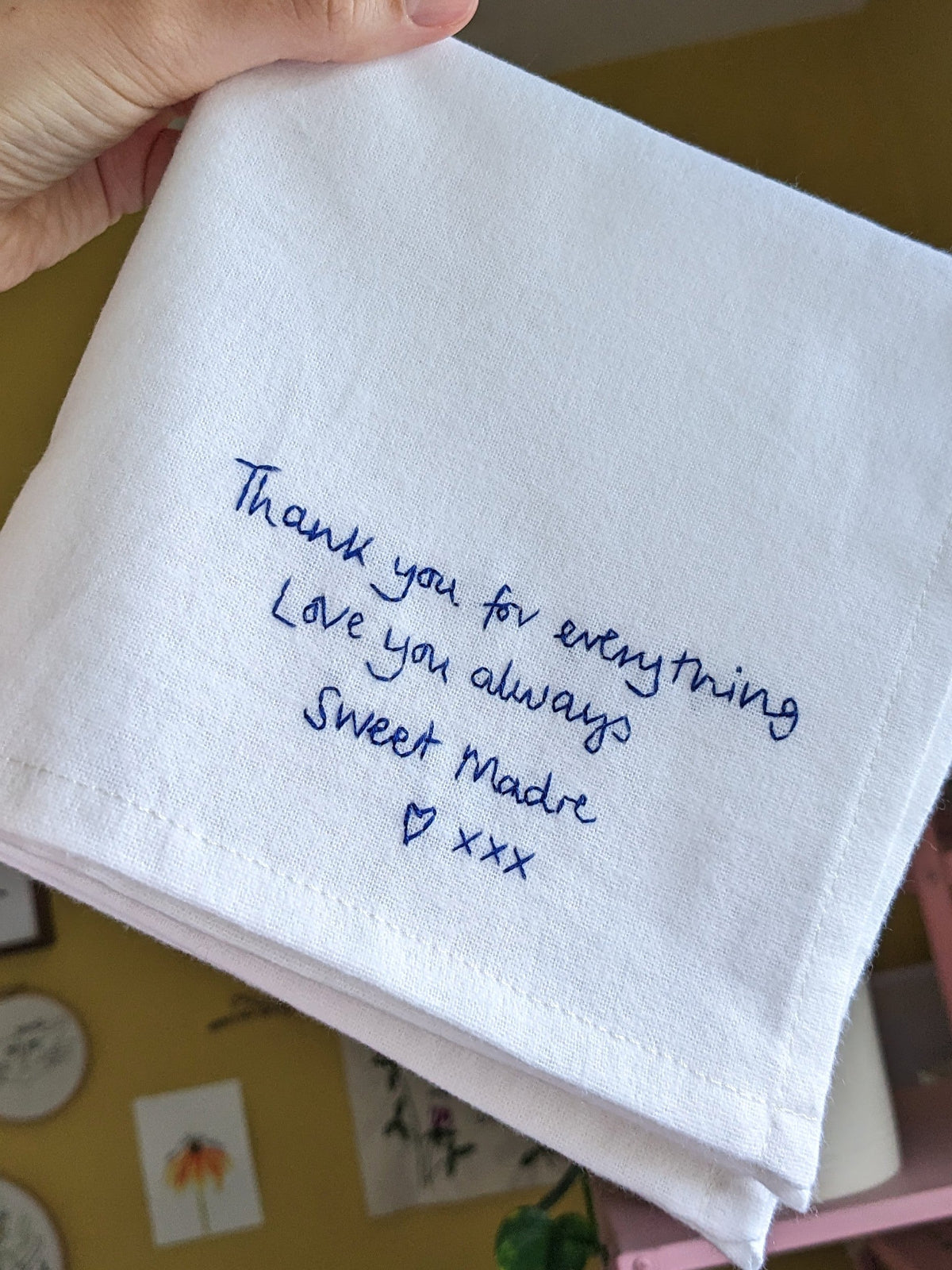 t-shirt hand embroidered with kids names as gift for partner