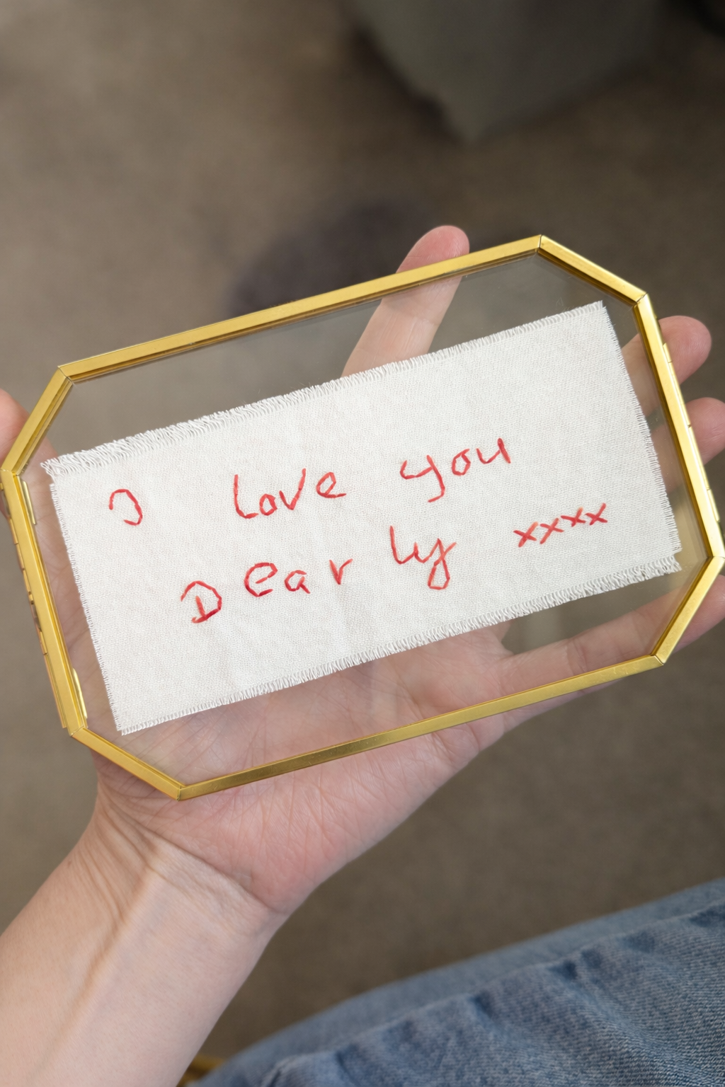 i love you hand embroidered on cotton and framed as valentines day gift