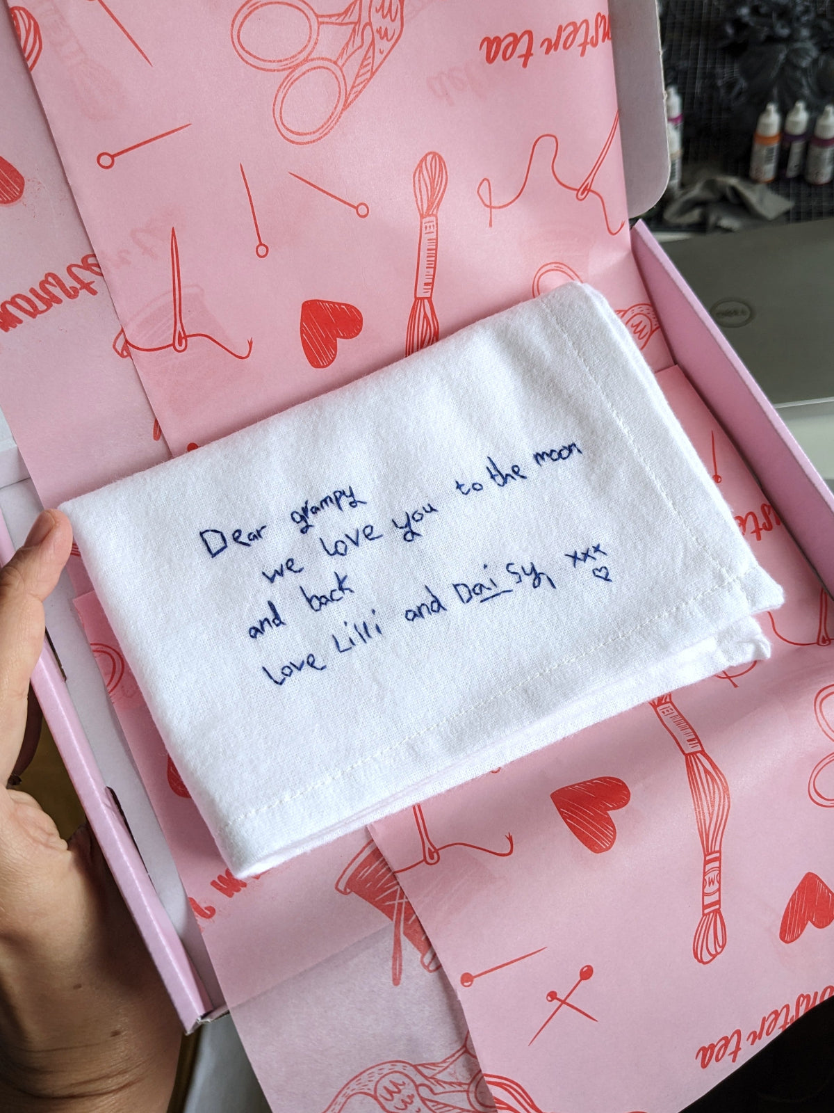 personalised child's handwriting handkerchief for grandad wrapped in pink and red tissue paper
