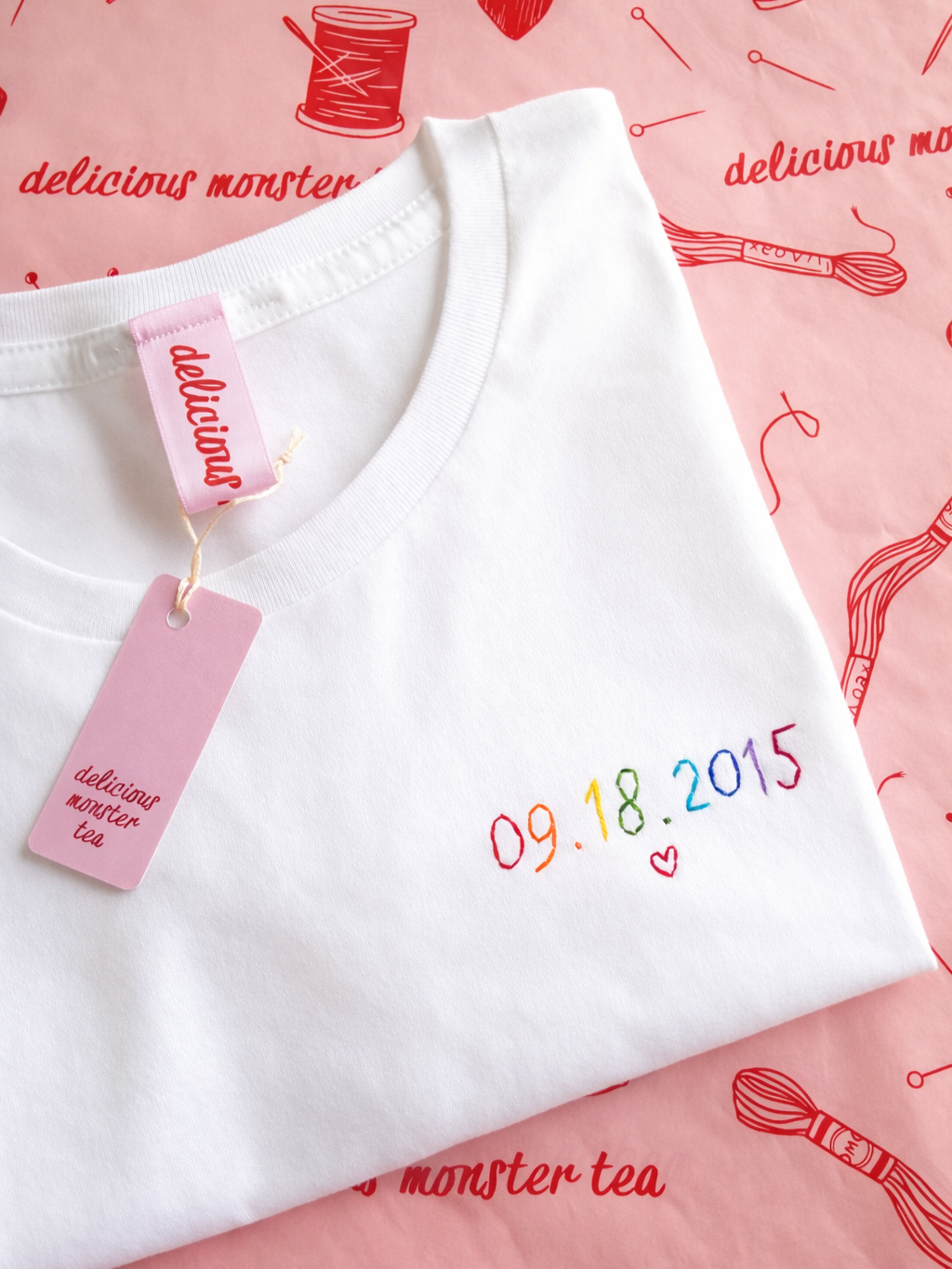 personalised embroidered t-shirt with wedding date and heart in rainbow embroidery
