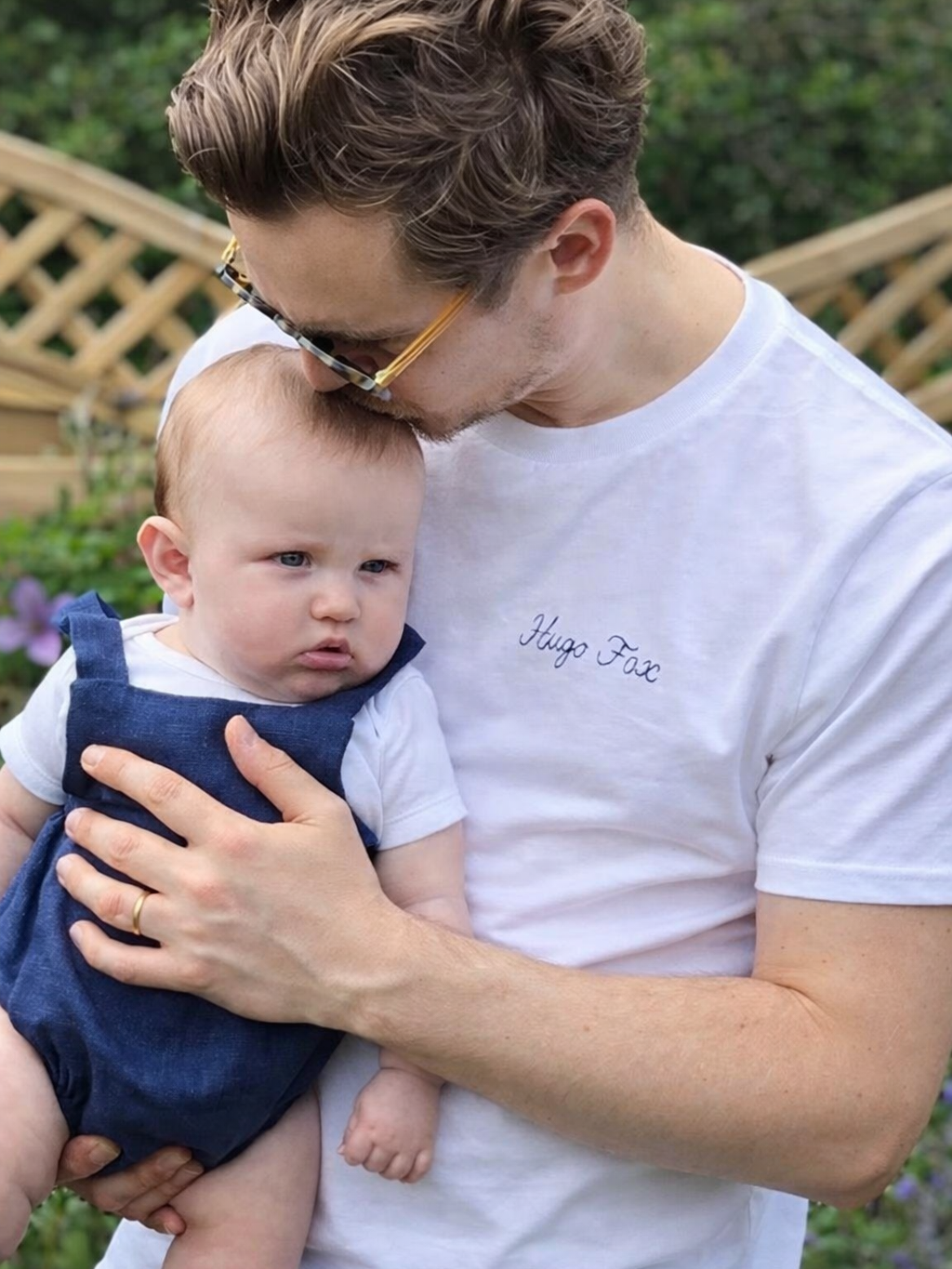 personalised embroidered t-shirt worn by dad with his new baby's name