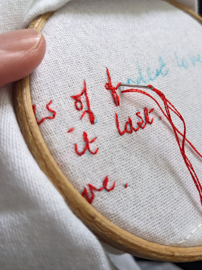personalised handwriting handkerchief being hand embroidered in red thread