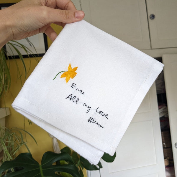 personalised handkerchief, hand embroidered with a handwritten message from mum and a daffodil
