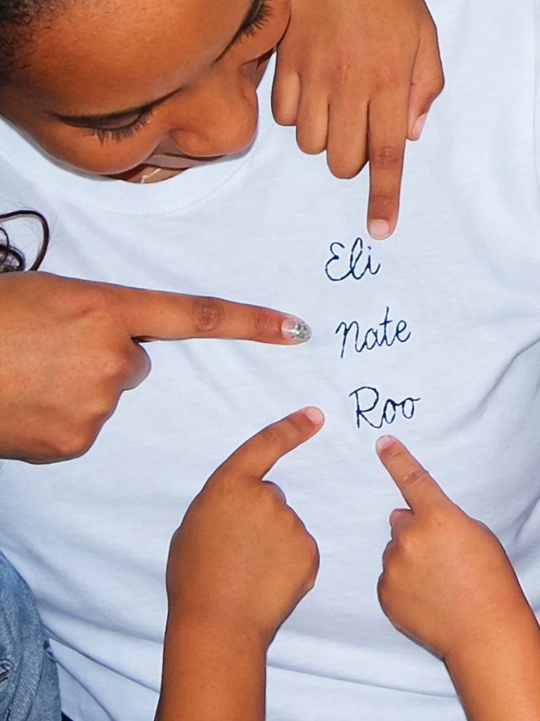 t-shirt hand embroidered with kids names as gift for partner