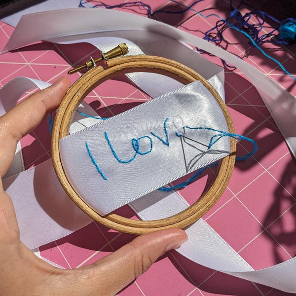 wedding ribbon for bridal bouquet, hand embroidered with a handwritten message from the bride's late grandad