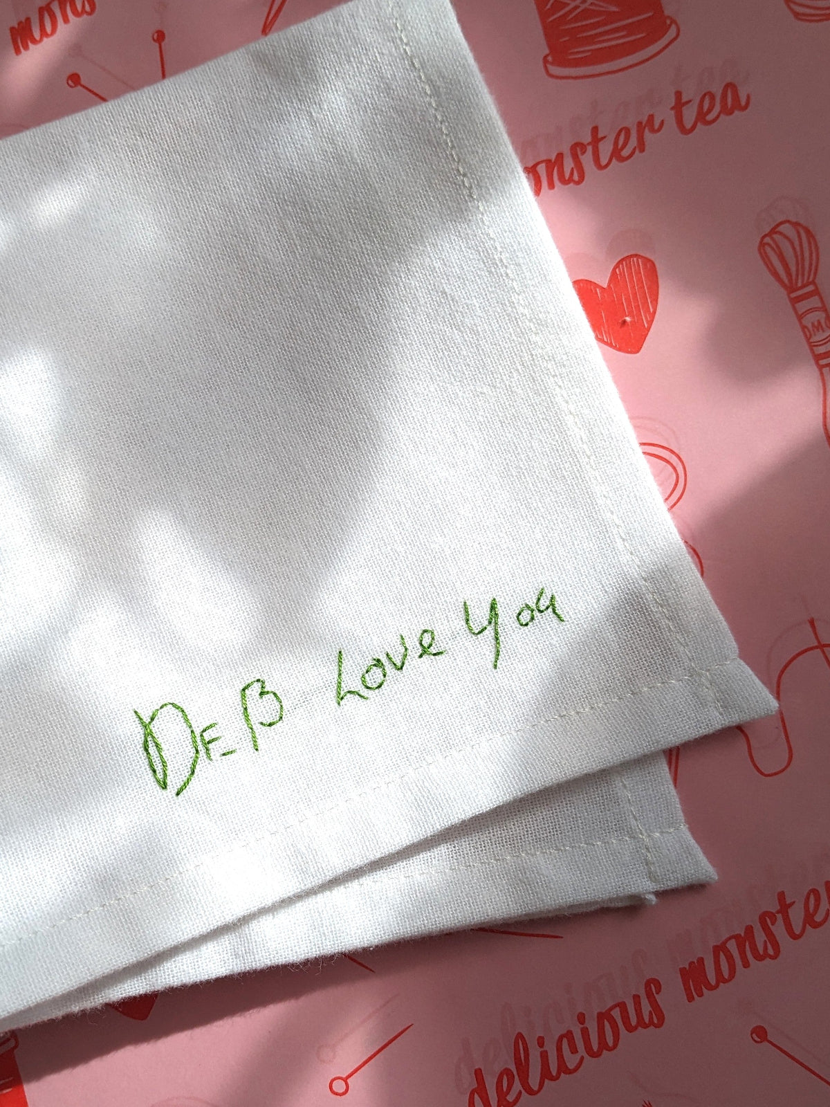 white cotton hanky embroidered with handwritten love note as second anniversary gift