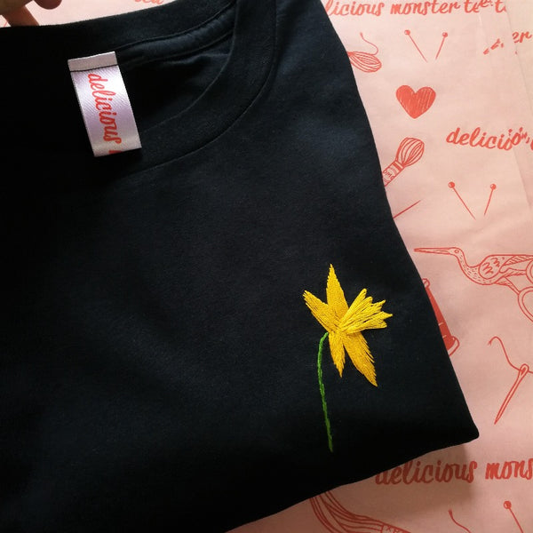welsh birth flower gift. organic cotton tshirt, hand embroidered with daffodil