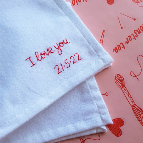 personalised handkerchief gift, made from white organic cotton, hand embroidered with custom message - I love you and date of second wedding anniversary