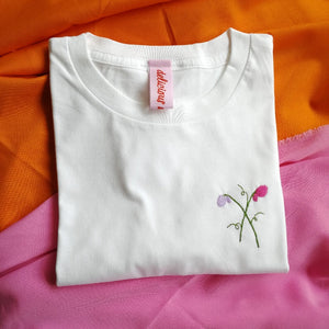 birth flower gift. organic cotton tshirt, hand embroidered with pink sweet peas